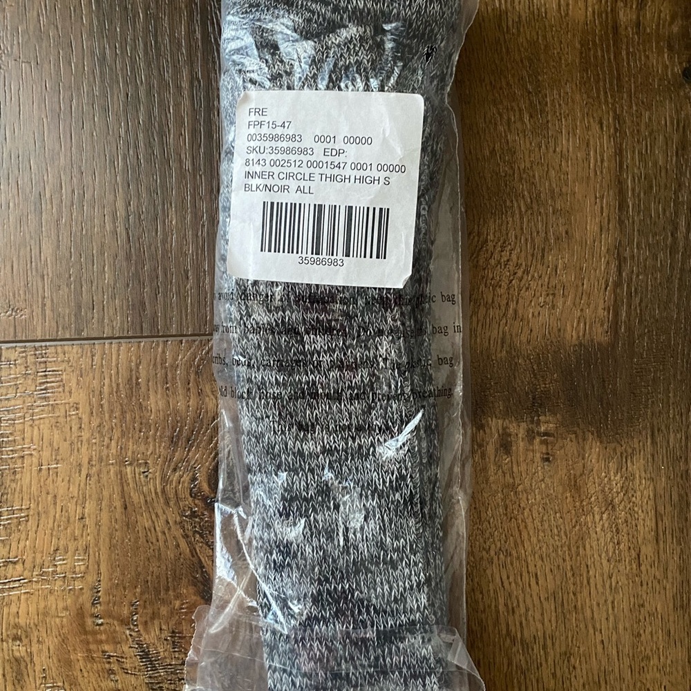 Brand NEW black and white marl knee high Free People socks. One size.